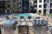 Thumbnail 9 of 41 - Entertainment Deck with Outdoor TV at Quarry at River North