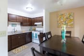 Thumbnail 1 of 13 - Kitchen and dining in a 2 bedroom apartment at  Addison on Main