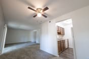 Thumbnail 10 of 12 - Open living and dining space with kitchen in a 2 Bedroom Apartment  at Woodlake Apartments