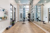 Thumbnail 35 of 44 - Modern fitness on demand studio with yoga equipment at Residences at The Green in Lakewood Ranch