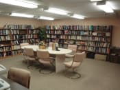 Thumbnail 10 of 18 - B'nai B'rith Deerfield Apartments in Deerfield Beach, FL well-stocked community library with seating