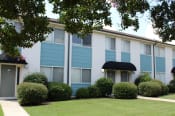 Thumbnail 2 of 30 - upgraded apartment homes with fresh paint, lush landscaping, and awnings over doors  at Huntsville Landing Apartments, Alabama
