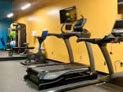 Thumbnail 20 of 24 - Fitness center with exercise equipment and large mirrors at Jemison Flats, Alabama, 35203