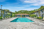 Thumbnail 2 of 32 - Invigorating Swimming Pool at The Oasis Apartments, Daytona Beach, Florida