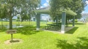 Thumbnail 6 of 23 - Outdoor grill stations with covered picnic seating