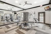 Thumbnail 16 of 22 - Fitness Center with strength and cardio machines.