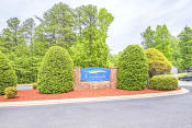 Thumbnail 1 of 25 - Community Entrance Sign with Shrubs