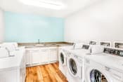 Thumbnail 12 of 25 - Clothing Care Center with Washers and Dryers