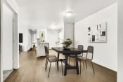 Thumbnail 13 of 28 - virtually staged dining room with hardwood-style flooring