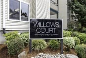 Thumbnail 2 of 19 - Welcome sign at Property Building at Willows Court Apartment Homes, Seattle, WA
