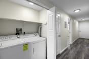 Thumbnail 25 of 30 - In unit laundry room with a washer and dryer at Swiss Gables Apartment Homes, Kent
