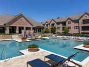 Thumbnail 6 of 13 - take a dip in the resort style pool at villas at houston levee west apartments