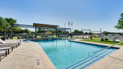 Thumbnail 18 of 39 - Swimming Pool With Relaxing Sundecks at Highland Luxury Living, Texas, 75067