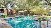 Thumbnail 13 of 29 - Crystal Clear Swimming Pool at Indian Creek Apartments, Carrollton, TX, 75007