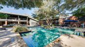 Thumbnail 16 of 29 - Relaxing Pool at Indian Creek Apartments, Texas