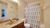 Thumbnail 10 of 30 - Bathroom With Bathtub at Woodland Hills, Texas, 75062