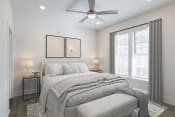 Thumbnail 13 of 15 - a white bedroom with a large bed and a ceiling fan