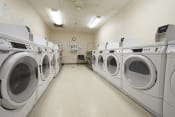 Thumbnail 9 of 10 - Laundry Facilities | Sencit Towne House Apartments