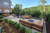 Thumbnail 5 of 21 - Outdoor Lounge at Merion Riverwalk Apartment Homes, Shelton, CT, 06484