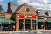 Thumbnail 16 of 23 - a target store on the corner of a city street