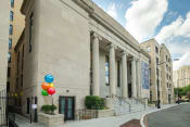 Thumbnail 6 of 41 - the facade of a building with balloons in front of it