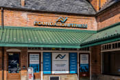 Thumbnail 18 of 23 - the front of a building with a sign that reads foundation fitness