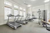 Thumbnail 25 of 43 - the gym with treadmills and other fitness equipment and windows