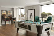 Thumbnail 19 of 26 - Game room with billiards and pinball machines