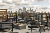 Thumbnail 14 of 26 - Rooftop lounge with view of Downtown Minneapolis