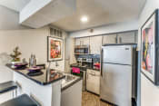 Thumbnail 10 of 16 - our spacious kitchen with stainless steel appliances and granite counter tops