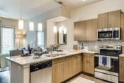 Thumbnail 7 of 36 - kitchen space in our luxury las colinas apartments