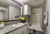 Thumbnail 9 of 26 - a bathroom with a sink toilet and shower