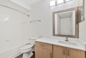 Thumbnail 9 of 35 - renovated bathroom with quartz countertops
