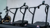 Thumbnail 38 of 42 - a pair of treadmills in a gym