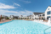 Thumbnail 17 of 32 - Swimming Pool with Lounge Seating at Hermosa Village, Leander, Texas