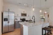 Thumbnail 4 of 32 - Gourmet Kitchen With Island at Hermosa Village, Leander