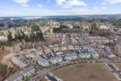 Thumbnail 32 of 32 - Dog-Friendly Apartments in Olympia, WA - Briggs Village - Aerial View of Community, Landscaping, and Neighborhood