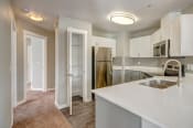 Thumbnail 11 of 38 - Clock Tower Village kitchen with stainless steel appliances
