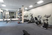 Thumbnail 13 of 22 - a large fitness room with treadmills and other exercise equipment