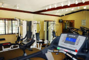 Thumbnail 8 of 18 - Siesta Pointe fitness center with cardio and weight equipment