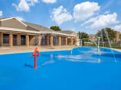 Thumbnail 16 of 32 - Monarch Pass Apartments in Fort Worth 76119 photo of  splash pad