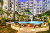 Thumbnail 11 of 30 - Juno at Winter Park apartments in Winter Park Florida photo of resort-style pool with firepit features