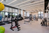 Thumbnail 9 of 19 - Apartments Miami FL - MB Station Fitness Center With Weight Machines, Free Weights, and Cardio Machines
