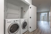 Thumbnail 6 of 45 - a washer and dryer in a laundry room