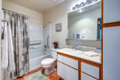 Thumbnail 4 of 13 - Bathroom with wood-style flooring