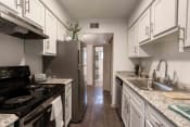 Thumbnail 4 of 20 - The Jaunt Apartments in Charleston South Carolina photo of kitchen with white cabinets