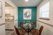 Thumbnail 3 of 20 - The Jaunt Apartments in Charleston South Carolina photo of a dining room area with table and painting