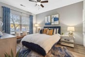 Thumbnail 5 of 29 - Sage at 1240 apartments in Mount Pleasant South Carolina photo of bedroom with hardwood flooring and ceiling fan