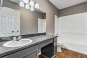 Thumbnail 16 of 19 - Whitney Manor Apartments in Gretna, LA photo of bathroom with long vanity