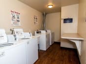 Thumbnail 13 of 23 - Laundry Center at apartment complex